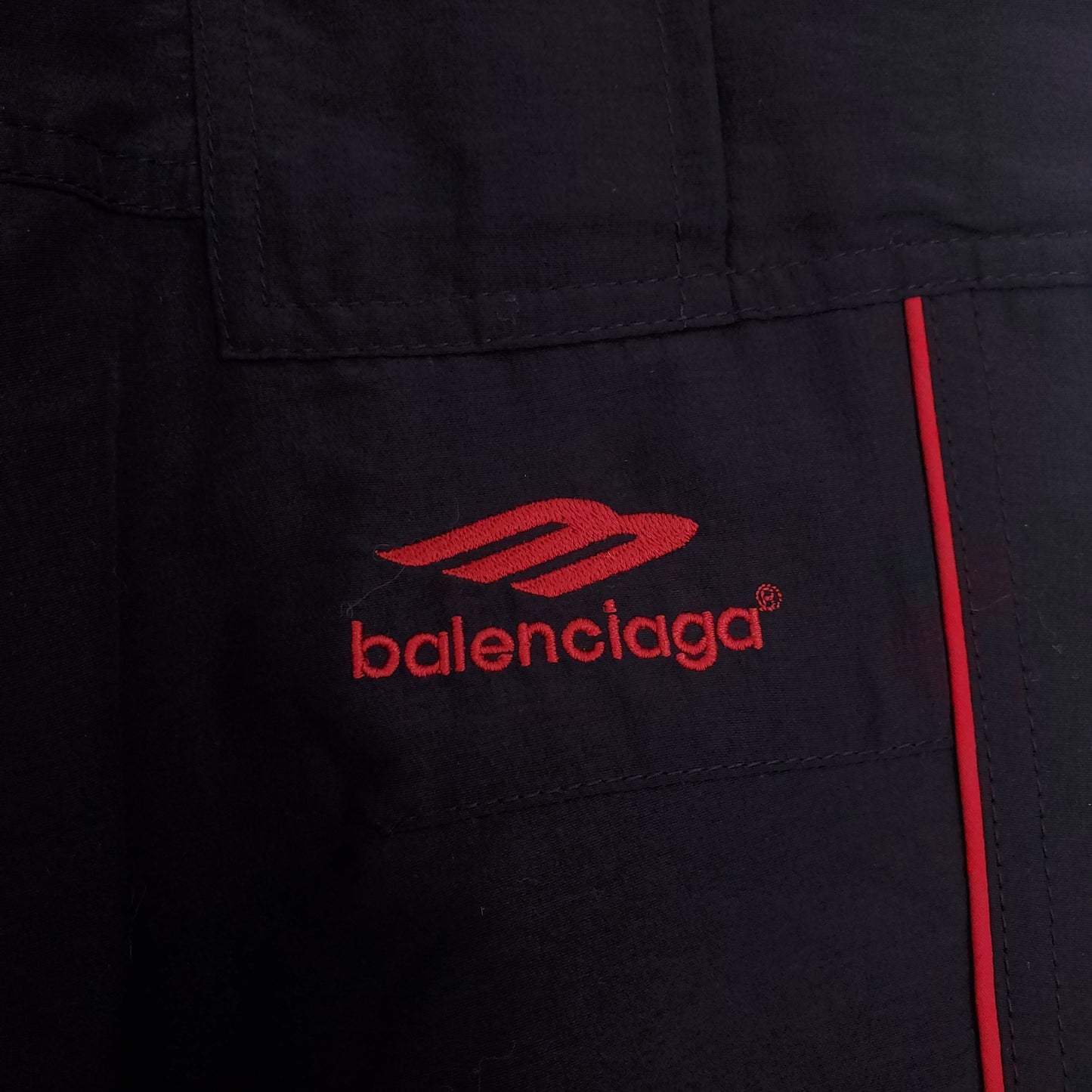 BALENCIAGA UNISEX BLACK CARGO PANTS WITH RED STRIPE - SIZE 48