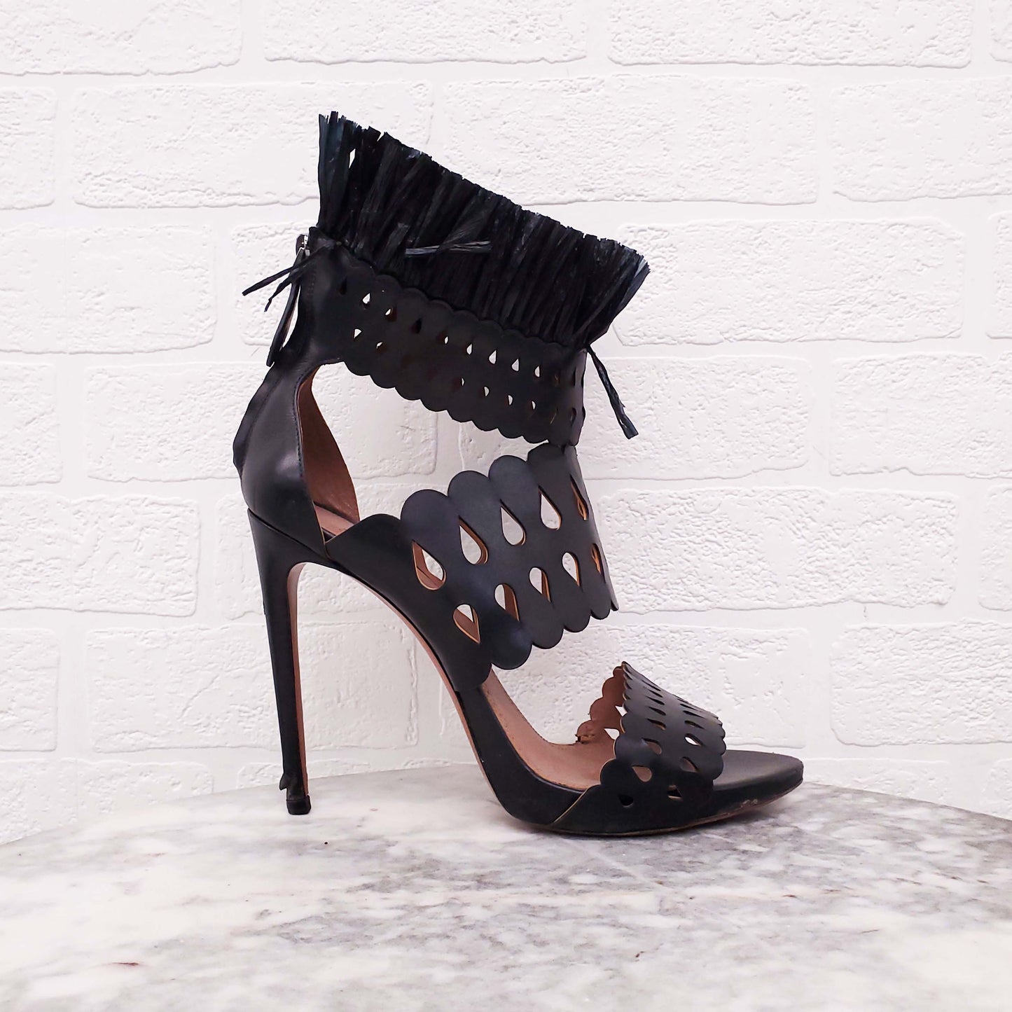 ALAÏA BLACK LASER CUT FRINGE HEELS - SIZE 41