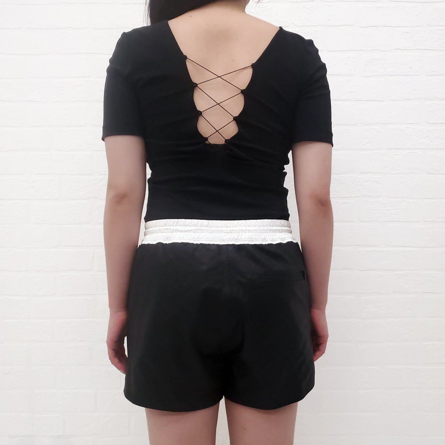 ALEXANDERWANG.T BLACK LACE UP BODYSUIT - SIZE XS