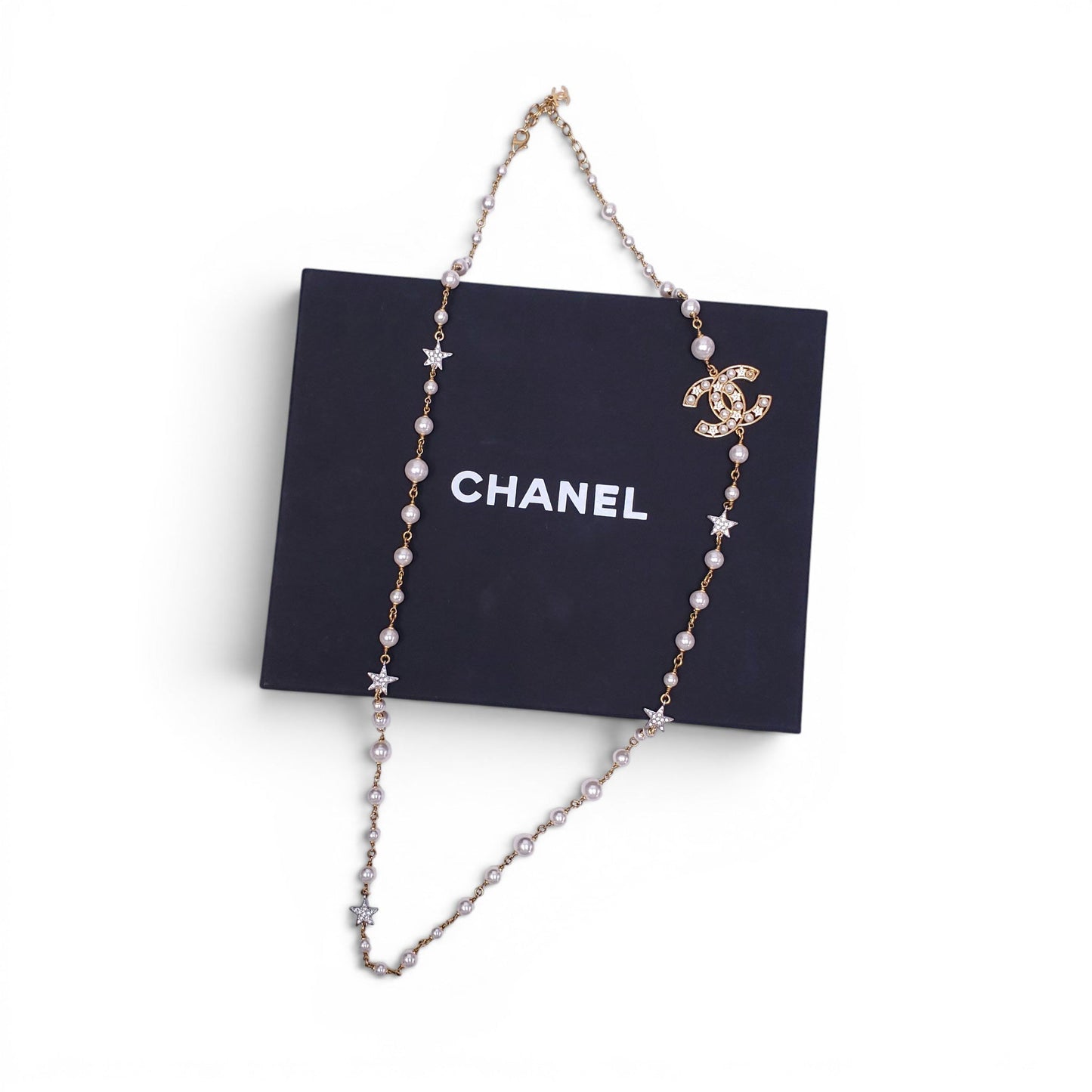 CHANEL GOLD NECKLACE WITH CREAM PEARLS, STARS, AND CC LOGO