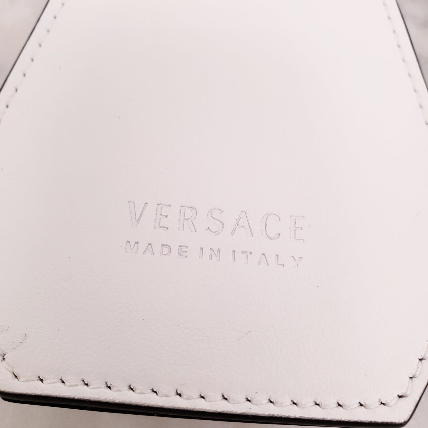 VERSACE WHITE STARFISH BAG CHARM